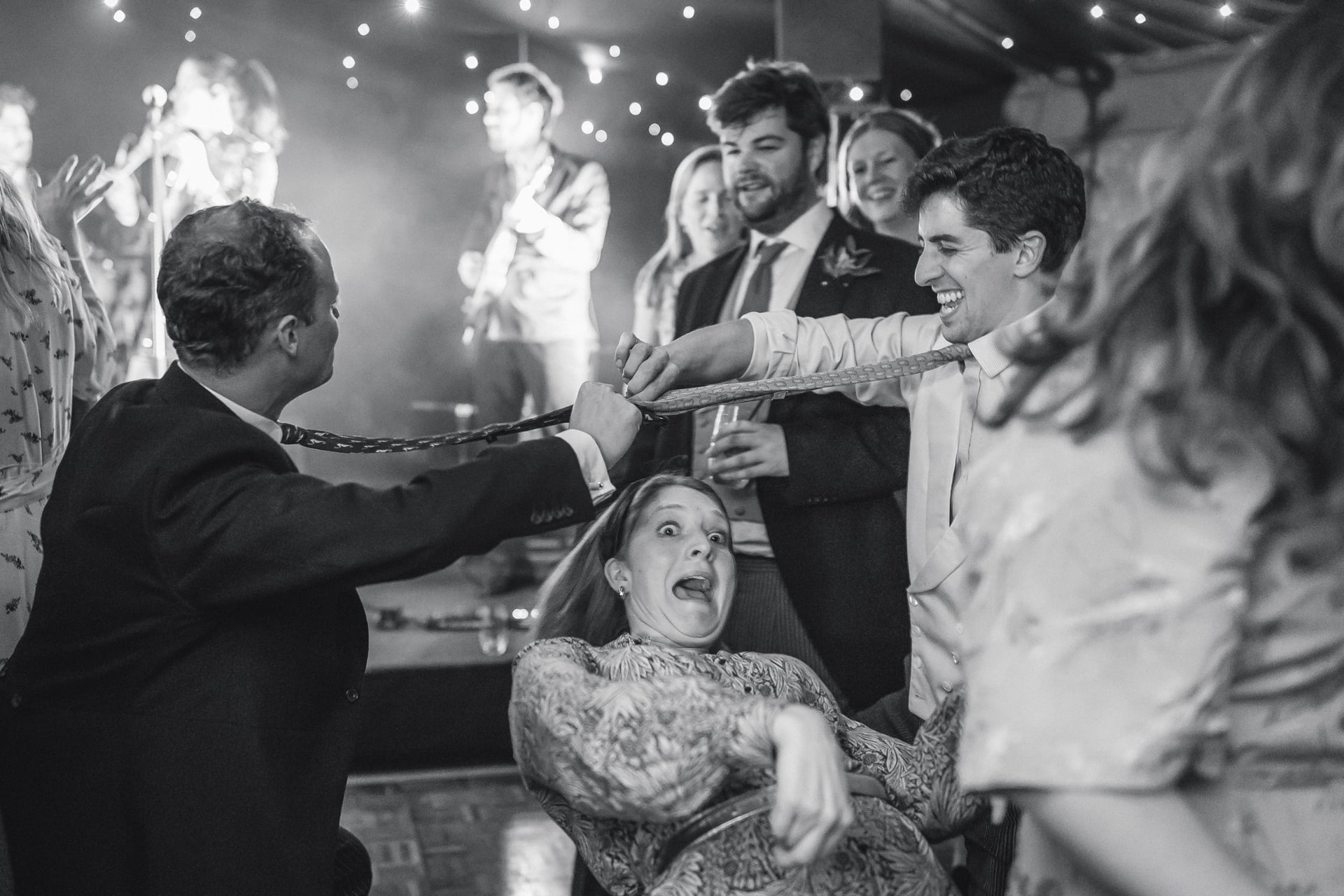 Star Club Band playing to a packed dance floor, in black and white