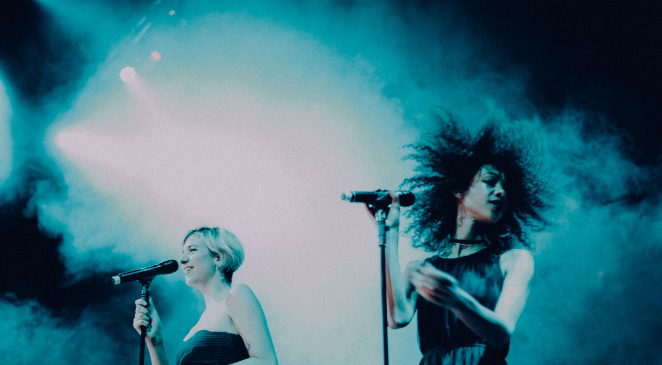 The Moments performing live